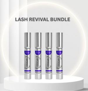 Four silver bottles with purple labels on a white platform, labeled 'Lash Revival Bundle'.
