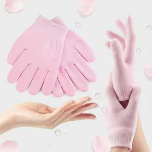 Pink gloves shown on a white background with a hand holding one glove.